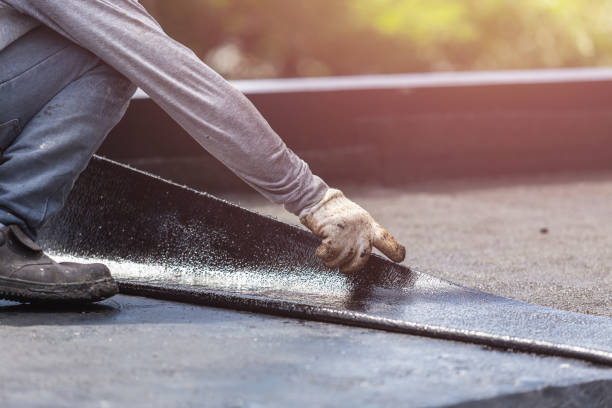 Professional Exterior Waterproofing technician working in Warsaw, KY